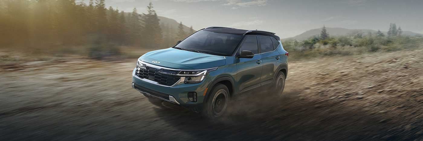 2024 Kia Seltos on a dirt path