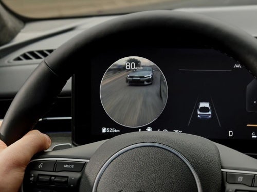 2025 KIA K5 view of driver's dash showing blind spot view monitor